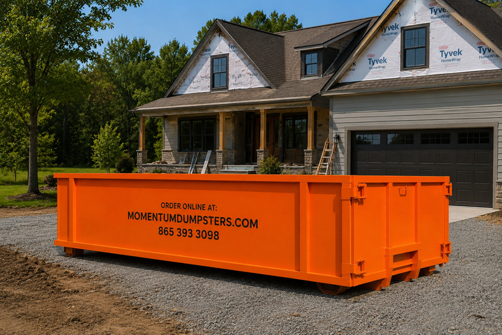 Large Momentum dumpster at a residential job site
